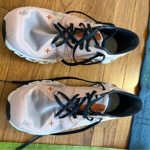 On Running Peach and Black Athletic Shoes